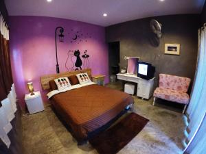 Postel nebo postele na pokoji v ubytování Payi Resort