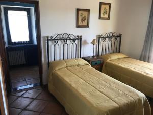 Ein Bett oder Betten in einem Zimmer der Unterkunft Casa Rural Los Robles