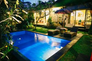 The swimming pool at or near Rumah Karda Ubud