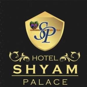 a logo for a hotel sharma palace with a shield at Hotel Shyam Palace in Bhuj