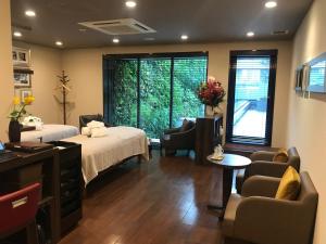 Postel nebo postele na pokoji v ubytování Hotel Mystays Premier Akasaka