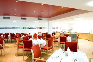 A restaurant or other place to eat at SPES Hotel & Seminare