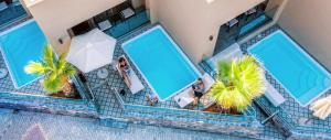 Výhled na bazén z ubytování Villaggio Boutique Hotel Hersonissos - Adults Only nebo okolí