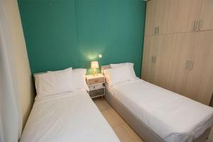 Posteľ alebo postele v izbe v ubytovaní V Luxury Apartment 3