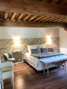 Postel nebo postele na pokoji v ubytování La Ferme de Gringalet