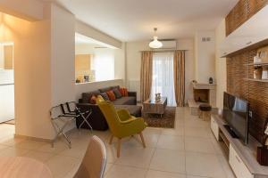 Χώρος καθιστικού στο V Luxury Apartment 4