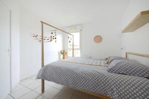 Llit o llits en una habitació de T2 cosy proche du centre-ville avec garage inclus