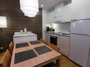 Virtuvė arba virtuvėlė apgyvendinimo įstaigoje Holiday Home Nordic chalet 9208 by Interhome