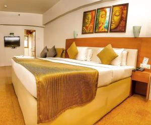 Postel nebo postele na pokoji v ubytování Hotel Samraj
