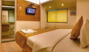 TV a/nebo společenská místnost v ubytování Hotel Samraj