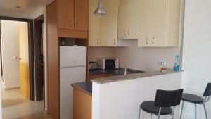 Kuchnia lub aneks kuchenny w obiekcie Urb. Los Collados .Águilas Apartamento