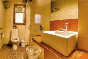 Koupelna v ubytování Hotel Samraj