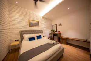Postel nebo postele na pokoji v ubytování Carnarvon Suites By Reunion