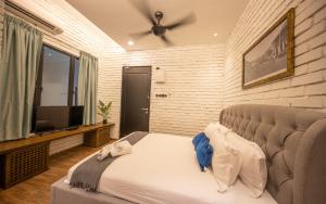 Postel nebo postele na pokoji v ubytování Carnarvon Suites By Reunion