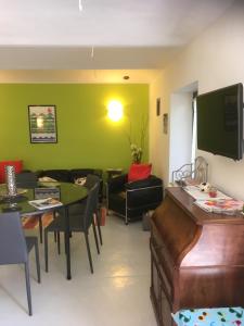 a living room with a couch and a table at cascina Filura in Mango