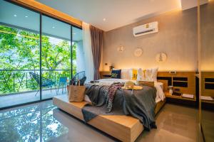 Posezení v ubytování The Woods Natural Park Resort Phuket