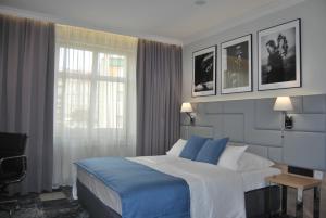 Posteľ alebo postele v izbe v ubytovaní Hotel Włoski Italia Boutique Old Town Poznań