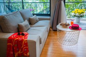 Posezení v ubytování The Woods Natural Park Resort Phuket