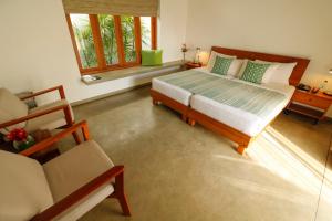 Posteľ alebo postele v izbe v ubytovaní Ubuntu Beach Villas by Reveal