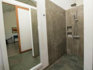 A bathroom at Ubuntu Beach Villas by Reveal