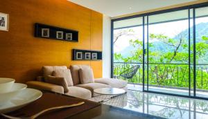 Posezení v ubytování The Woods Natural Park Resort Phuket