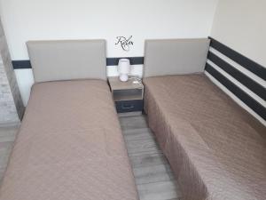 Postel nebo postele na pokoji v ubytování Apartment RELAX