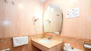 Koupelna v ubytování Hotel Albero
