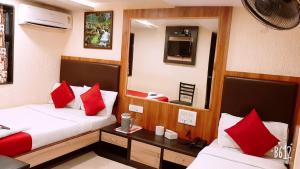 Postel nebo postele na pokoji v ubytování Hotel Happyland