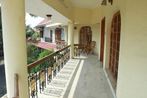 Balkón nebo terasa v ubytování Metropolitan Serviced Villa