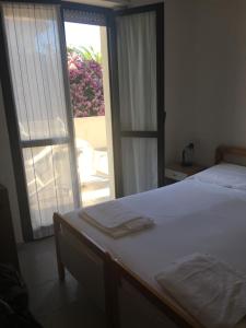 Postel nebo postele na pokoji v ubytování Hotel Alb's + 37 fotografií