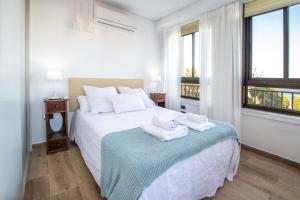 Posteľ alebo postele v izbe v ubytovaní Apartamento Albatro´s suite