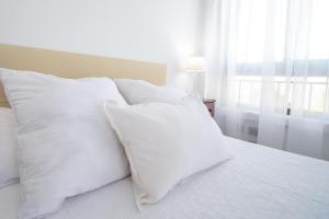 Posteľ alebo postele v izbe v ubytovaní Apartamento Albatro´s suite
