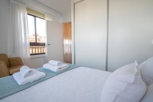 Posteľ alebo postele v izbe v ubytovaní Apartamento Albatro´s suite