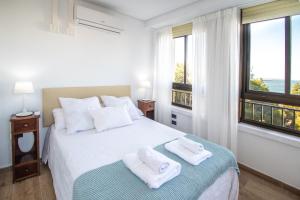 Posteľ alebo postele v izbe v ubytovaní Apartamento Albatro´s suite