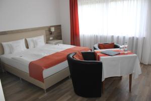 Postel nebo postele na pokoji v ubytování Pension Haus Erika