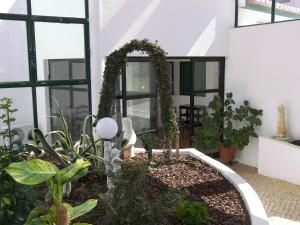 Een tuin van Hotel Rural Quinta de Santo Antonio