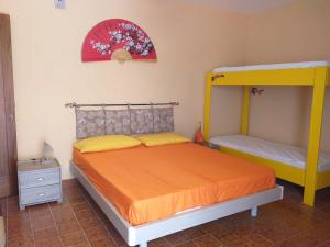 A bed or beds in a room at TROPEA BIANCA Még 17 kép