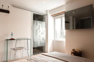Uma cama ou camas num quarto em B&B 7e Art