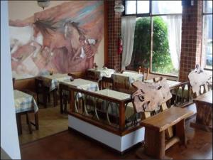 Restorāns vai citas vietas, kur ieturēt maltīti, naktsmītnē Hotel Carilo