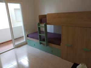 A bed or beds in a room at Duplex appartement Arabella