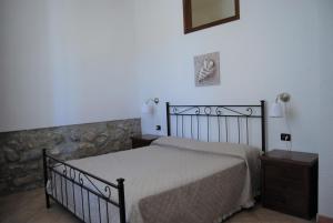 A bed or beds in a room at Villa Sara