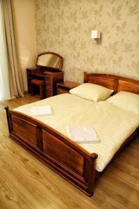 Cama o camas de una habitación en Zajazd Ostęp