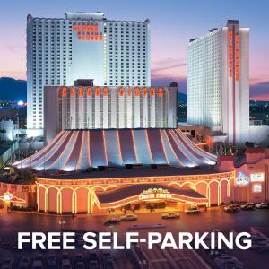 a building with a sign that reads free self parking at Circus Circus Hotel, Casino & Theme Park in Las Vegas