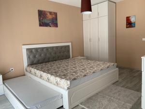 Postel nebo postele na pokoji v ubytování Apartments Divoli