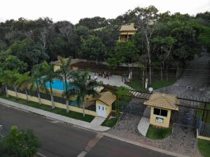 an aerial view of a resort with a swimming pool at Villa Verona in Praia do Forte