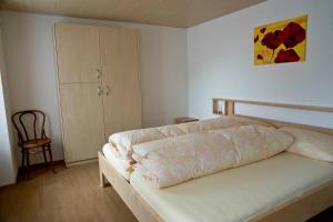 Postel nebo postele na pokoji v ubytování Hotel Alpina