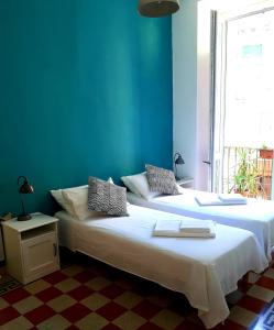 Ένα ή περισσότερα κρεβάτια σε δωμάτιο στο Apartment Ostiense Piramide Station