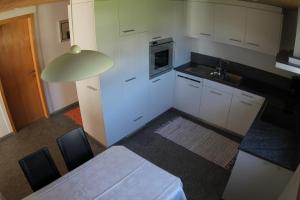 Kuchyň nebo kuchyňský kout v ubytování Ferienwohnung Rigoleth