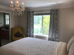 Postel nebo postele na pokoji v ubytování Royalty B&B