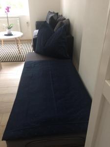 Łóżko lub łóżka w pokoju w obiekcie Apartmán nad Imperiálem